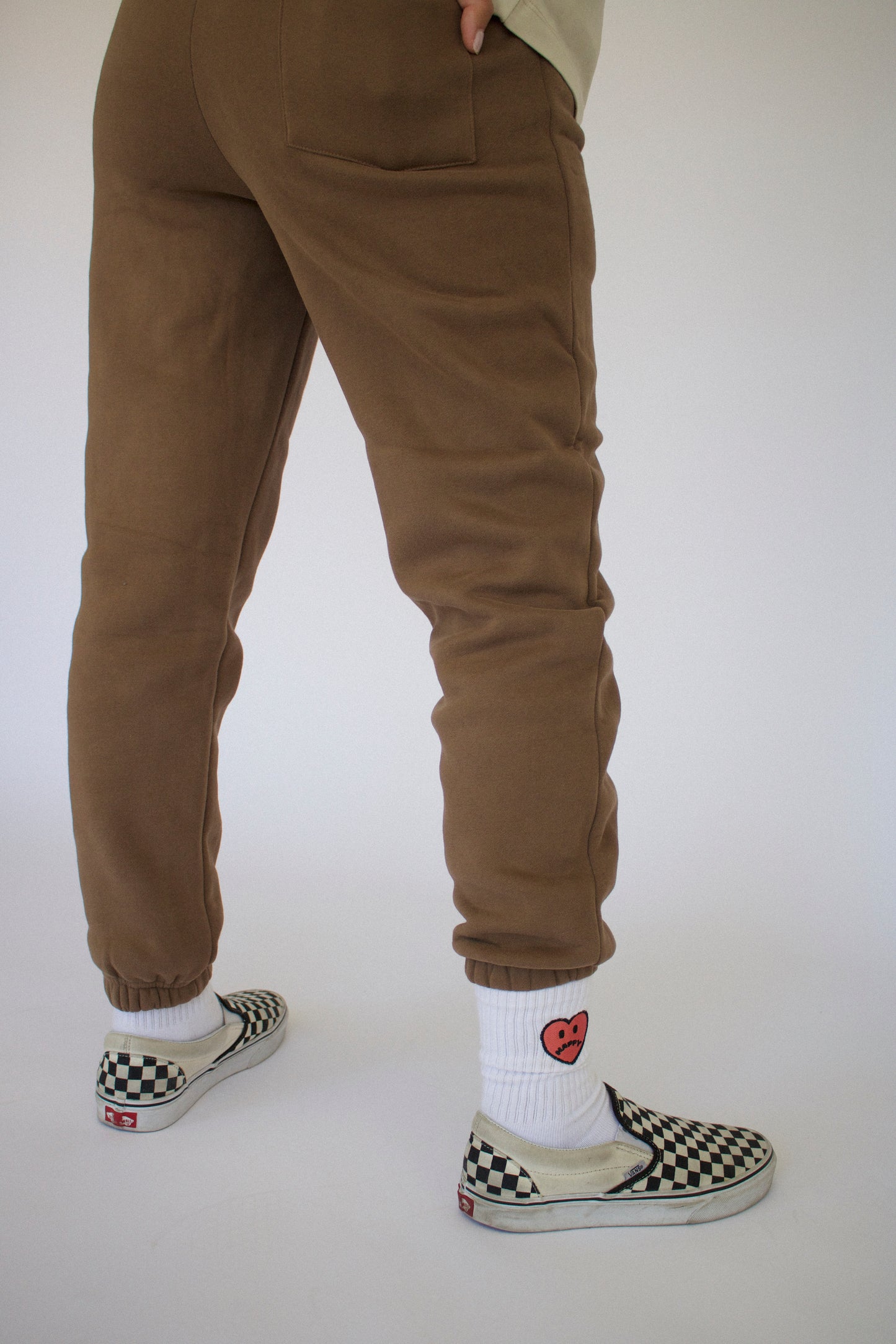 Happy Home centerpiece socks on model — limited drop streetwear accessory