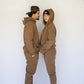 Happy Home chocolate sweatpants on model — limited edition drop streetwear brand