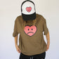 Model wearing Happy Home wood tee — founder-owned streetwear with earthy color palette