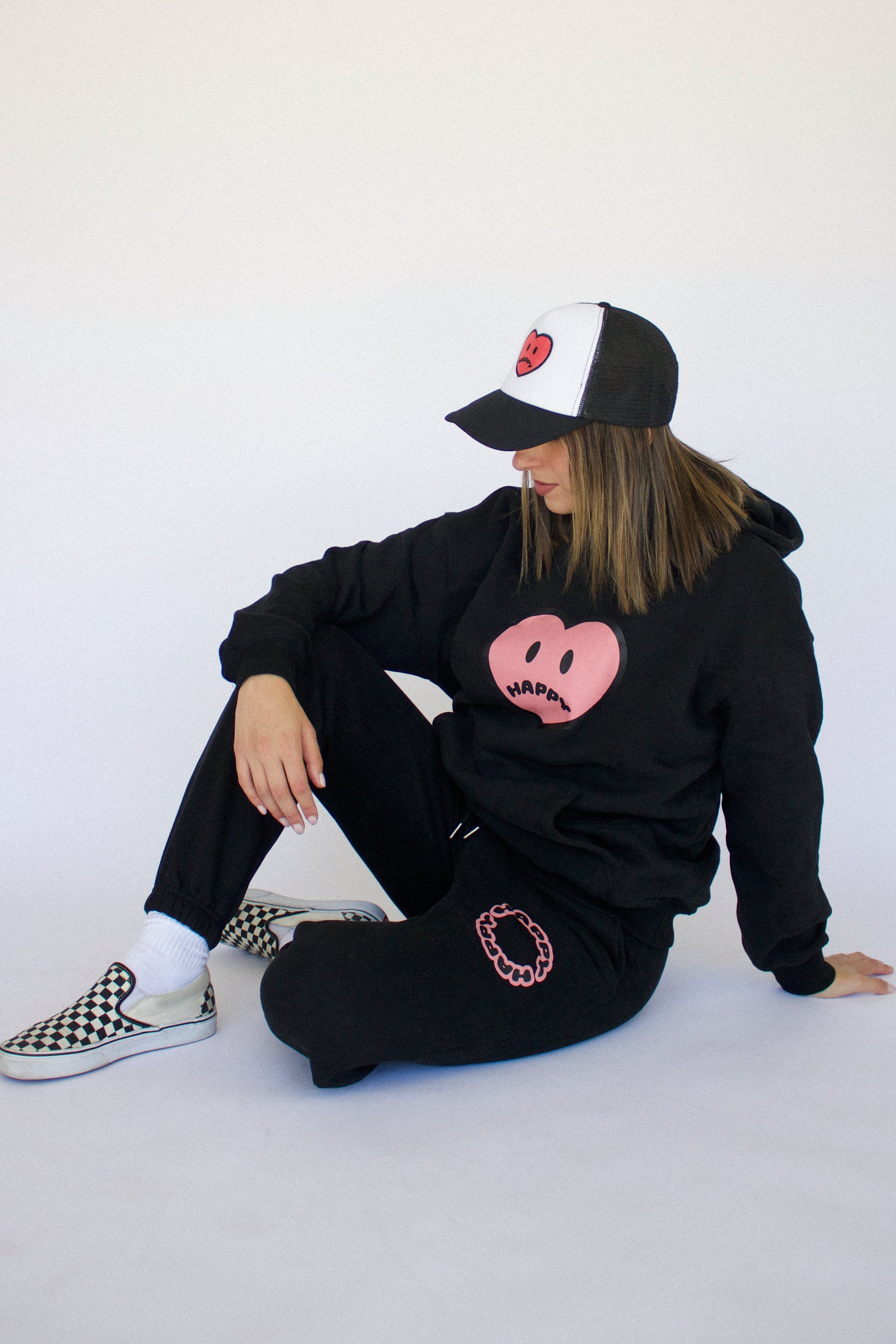 Happy Home centerpiece hoodie jet black lifestyle — mental health hoodie brand supports NAMI