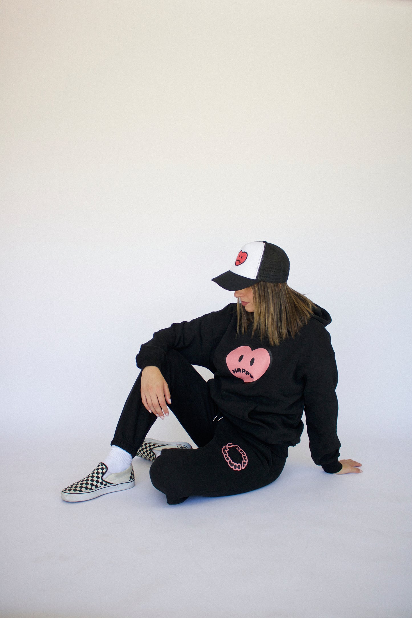 Happy Home centerpiece sweat set jet black lifestyle — matching streetwear set with a cause