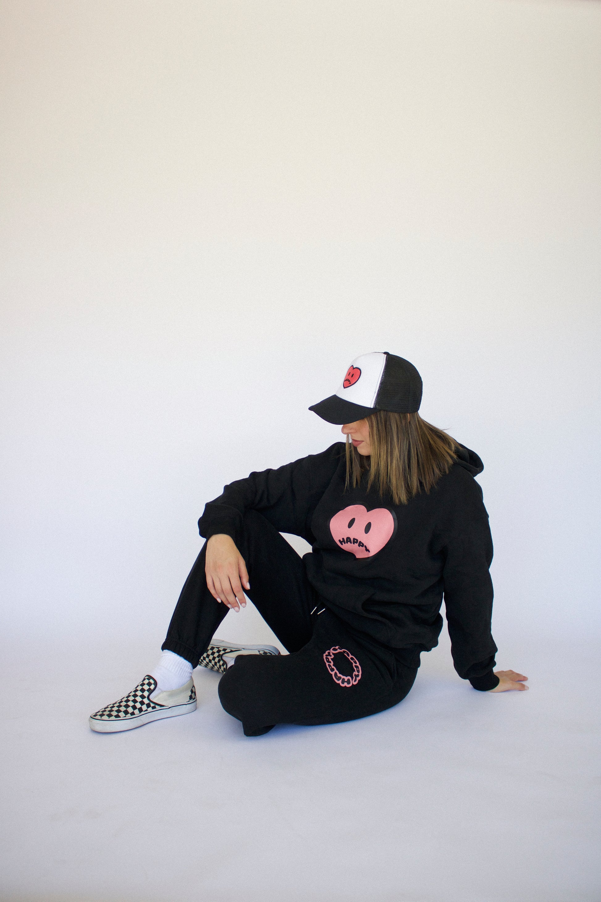 Happy Home centerpiece sweat set jet black lifestyle — matching streetwear set with a cause