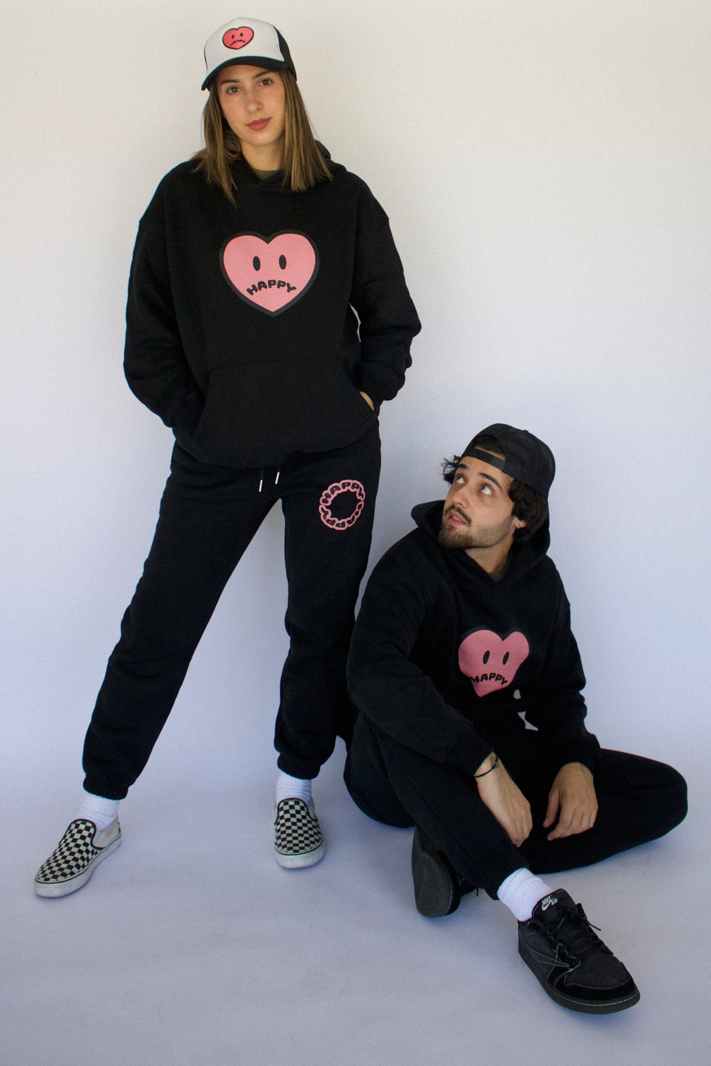 Happy Home jet black sweat set on model — limited 240-piece drop no restock