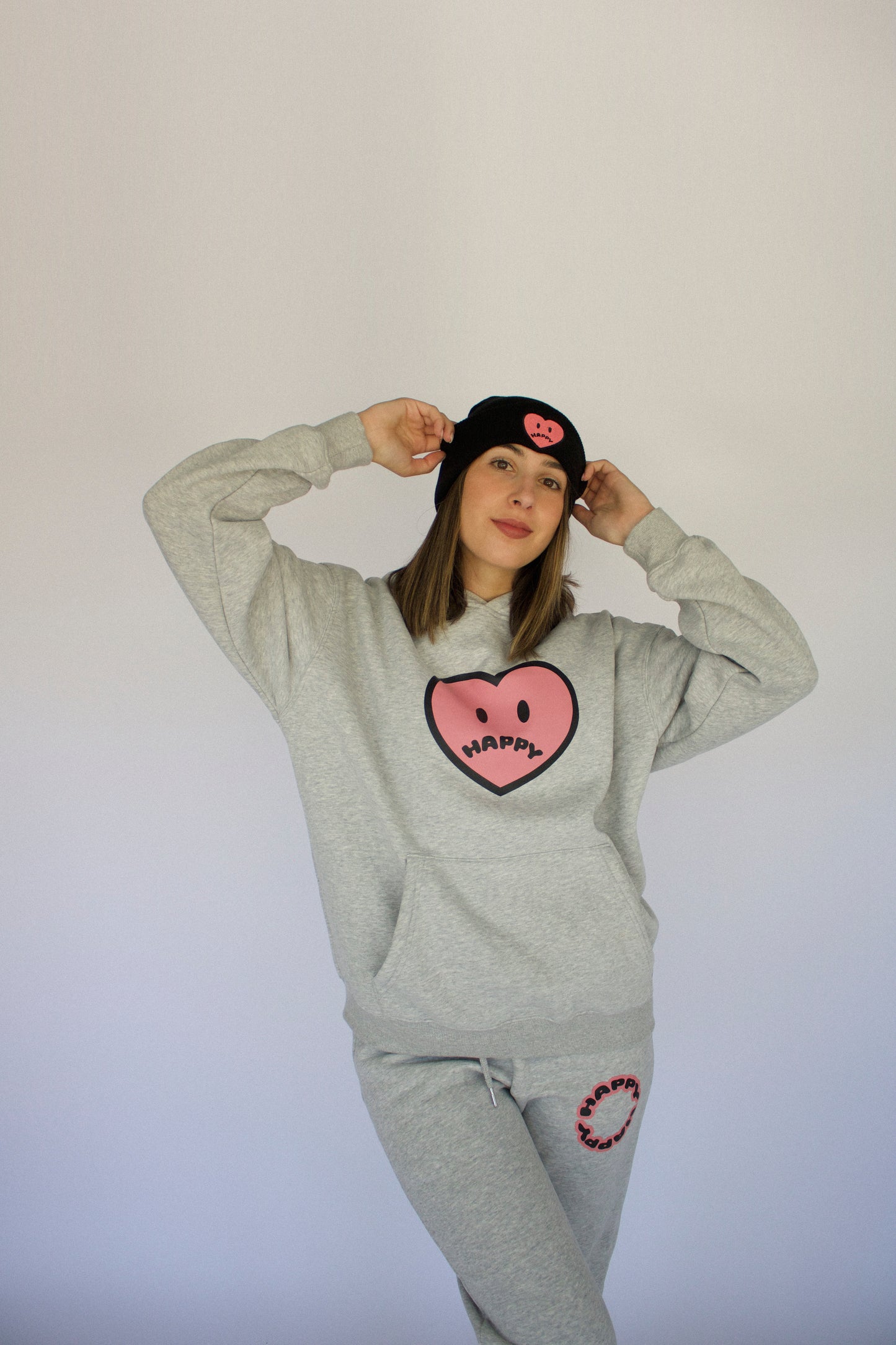 Model wearing Happy Home heather gray hoodie — founder-owned streetwear brand supports NAMI