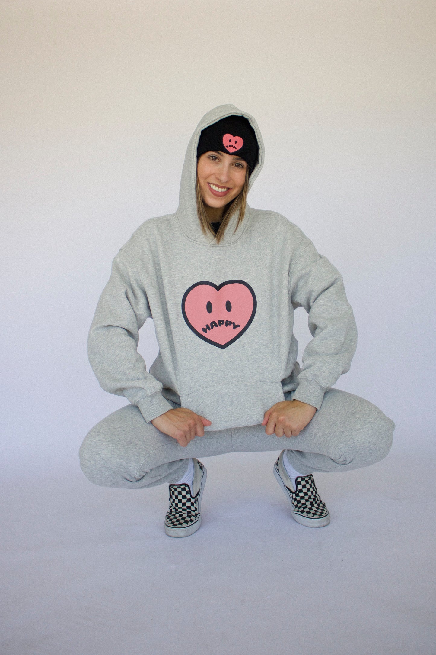 Happy Home centerpiece hoodie heather gray lifestyle — mental health streetwear with a cause