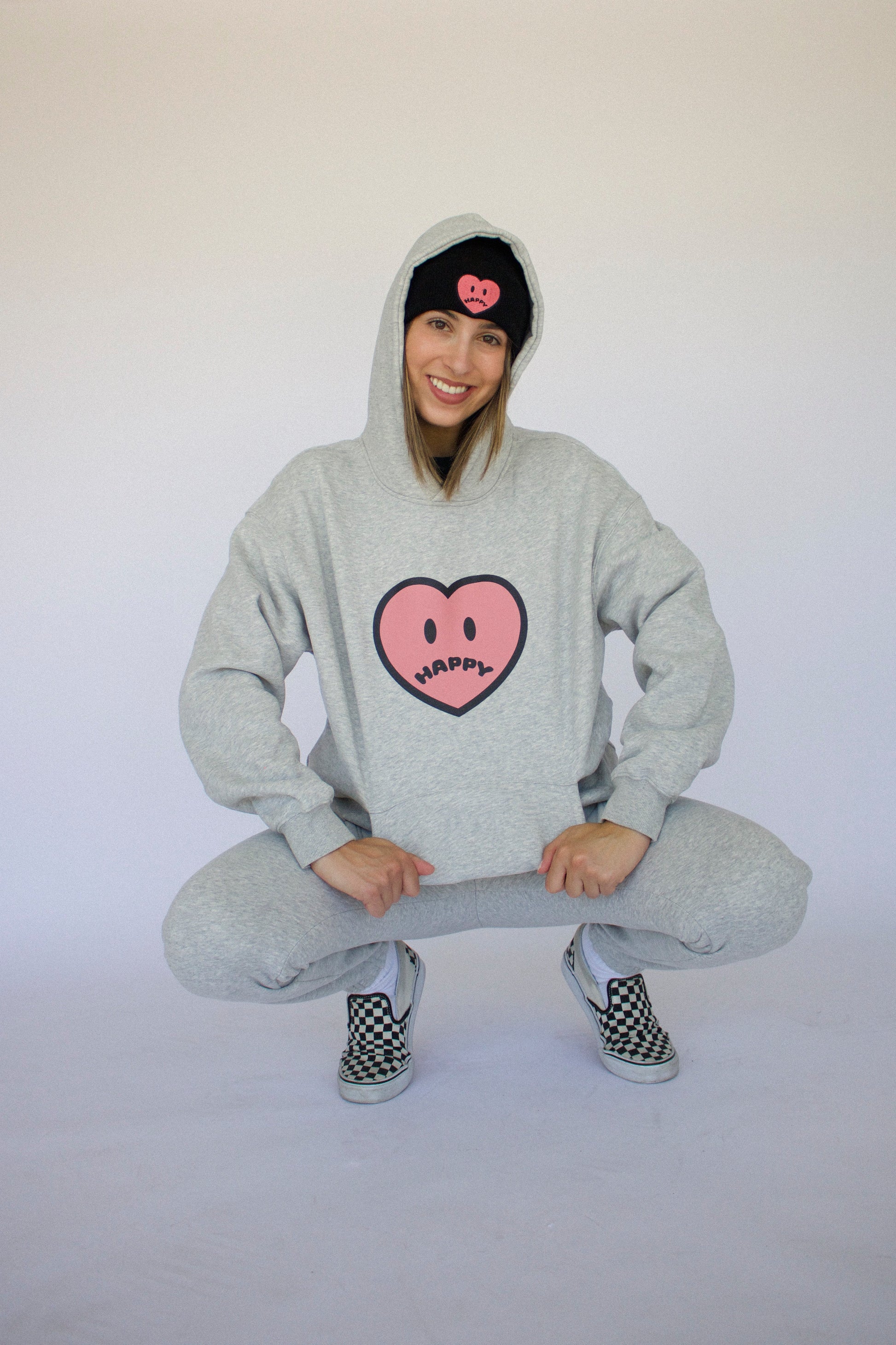 Happy Home centerpiece hoodie heather gray lifestyle — mental health streetwear with a cause