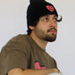 Happy Home beanie lifestyle photo — limited drop streetwear accessory