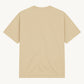 Happy Home centerpiece tee sand back — minimal earthy streetwear supports NAMI