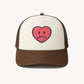 Happy Home centerpiece trucker hat chocolate front — embroidered HAPPY logo, one size